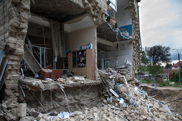 Room sections in the half-destroyed building
