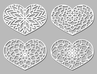Set of Vector Stencil lacy hearts with carved openwork pattern. - 136565538