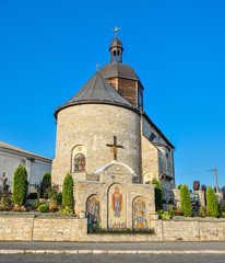Fototapeta na wymiar October 20, 2016 - Kamianets-Podilskyi, Ukraine. Old Holy Trinity Church, Kamianets-Podilskyi, Ukraine. Ancient beautiful church and bright blue sky background