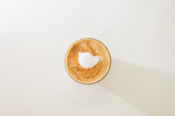 Fresh coffee on a table White