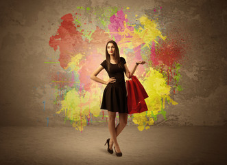 Girl with shopping bags and paint splatter