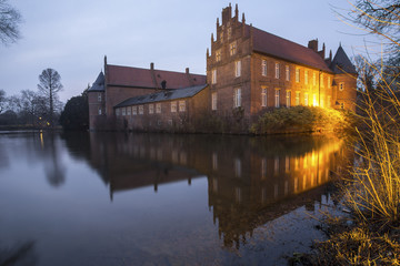 Fototapeta na wymiar water castle herten germany in the evening