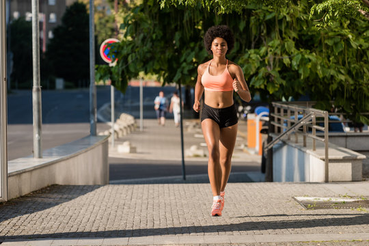Fitness woman running in the morning