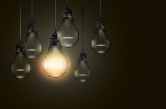 Set of hanging realistic bulbs on dark background