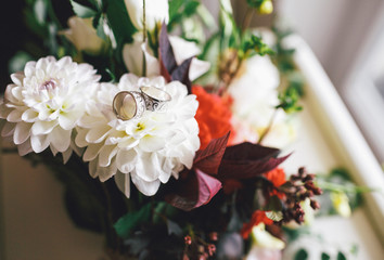 Wedding rings on the bridal bouquet