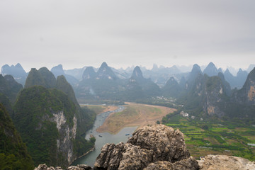 view from the top of hill - karst mountain and river  landscape in Xingping, Yangsho, China.