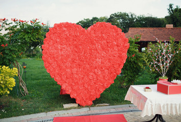 Big heart made from roses on the reception