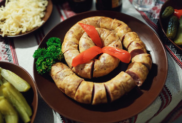 Ukrainian sausage on the wedding table in the restaurant