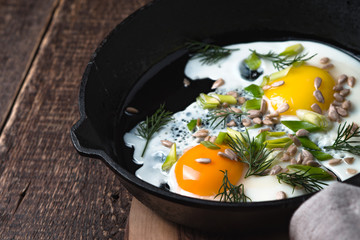 Scrambled eggs  on the wooden table horizontal