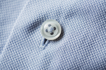close up of blue shirt button