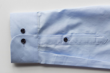 close up of blue shirt sleeve
