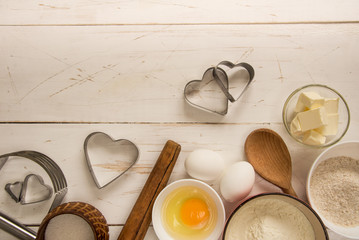 Baking ingredients for pastry on the wooden background