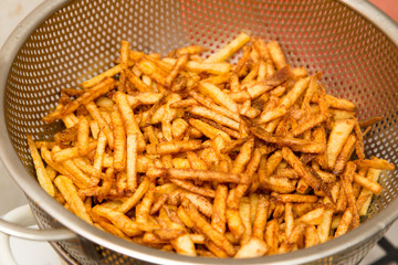 cooking potato fries in oil