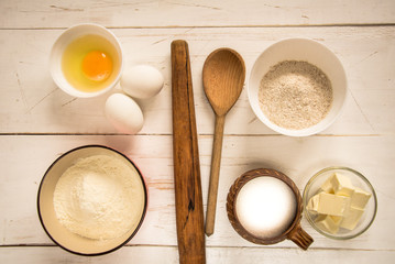 Baking ingredients for pastry on the wooden background