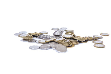 scattered coins on a white background 