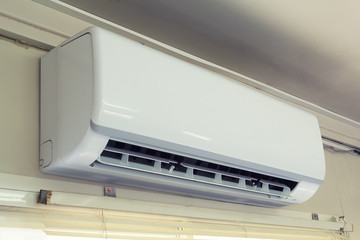 Air conditioner (AC) indoor unit or evaporator and wall mounted. That is part of mini split system or ductless system type. For removing heat and moisture from room, Temperature and humidity control.