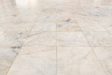Real marble floor tile in perspective with beige abstract texture pattern of natural material i.e....