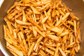 cooking potato fries in oil