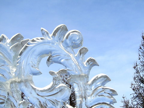 Transparent ice sculpture against the sky