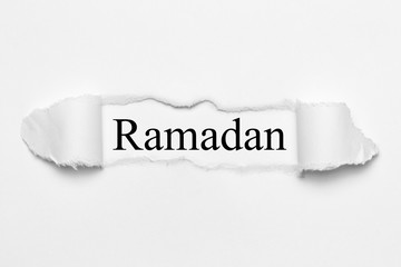 Ramadan on white torn paper