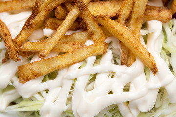 mayonnaise french fries as a background