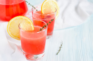 Fruit pink lemonade in glasses