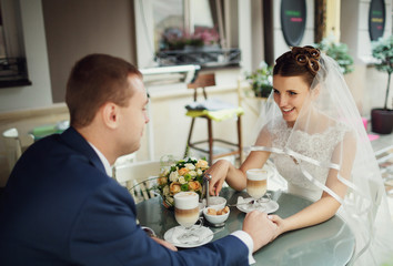 young happy couple enjoying the time before the ceremony