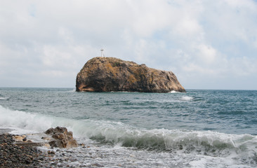 Fototapeta na wymiar rock of St.George in Black sea at cape Fiolent, Crimea, Russia