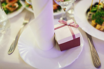 box with a gift for guests