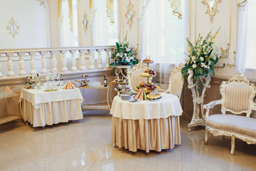 luxurious room with tables for buffets