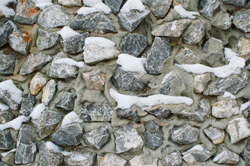 Abstract background of the surface stones pebble blue color in a frozen cement