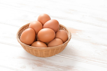 Brown Hen Eggs in Woven Wicker Tray