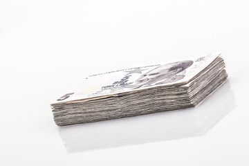 Turkish lira banknotes on white
