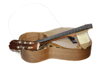 Acoustic guitar broken into pieces