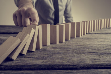 Stopping dominoes from crumbling