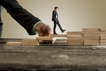 Businessman in business suit walking up steps