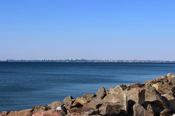 granite stones in the blue sea