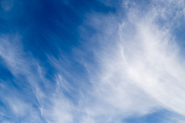clouds in the blue sky as background