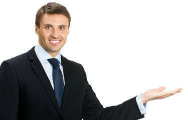 businessman showing something or copyspase