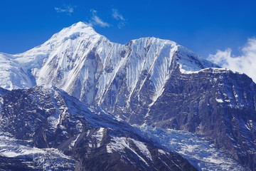 Nepal mountain landscape. Annapurna massif and the glacier, at Annapurna Circuit, Himalayas, Asia. Horizontal view for a postcard or calendar.