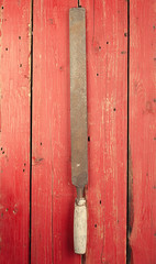 Tools. Rasp on wooden background. Ready to work.