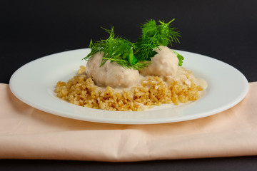 Plate with meatballs and bulgur