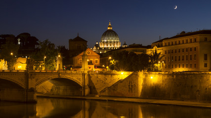 Fototapeta premium Tiber of Rome at Night with Saint Peter's Basilica on background