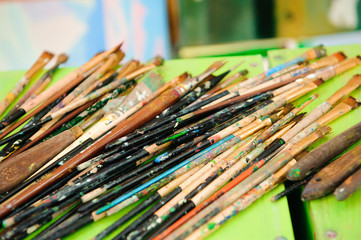 Obraz premium used paint palette, watercolors, brush - art lesson
