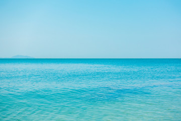 Fototapeta na wymiar Calm Sea Ocean And Blue Clear Sky Background.