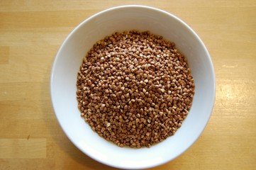 detail of buckwheat in a ceramic white bowl - 136598745