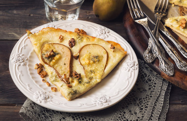 Homemade pizza with pear and blue cheese