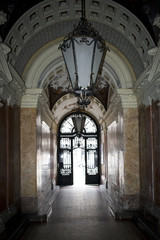 Fototapeta premium Artistic staircase with a fancy gate and chandelier in Budapest, Hungary