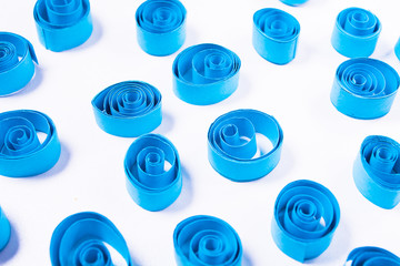 Quilling art. Blue paper curls