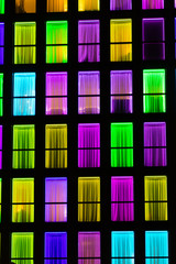 Colored windows texture. Neon light background